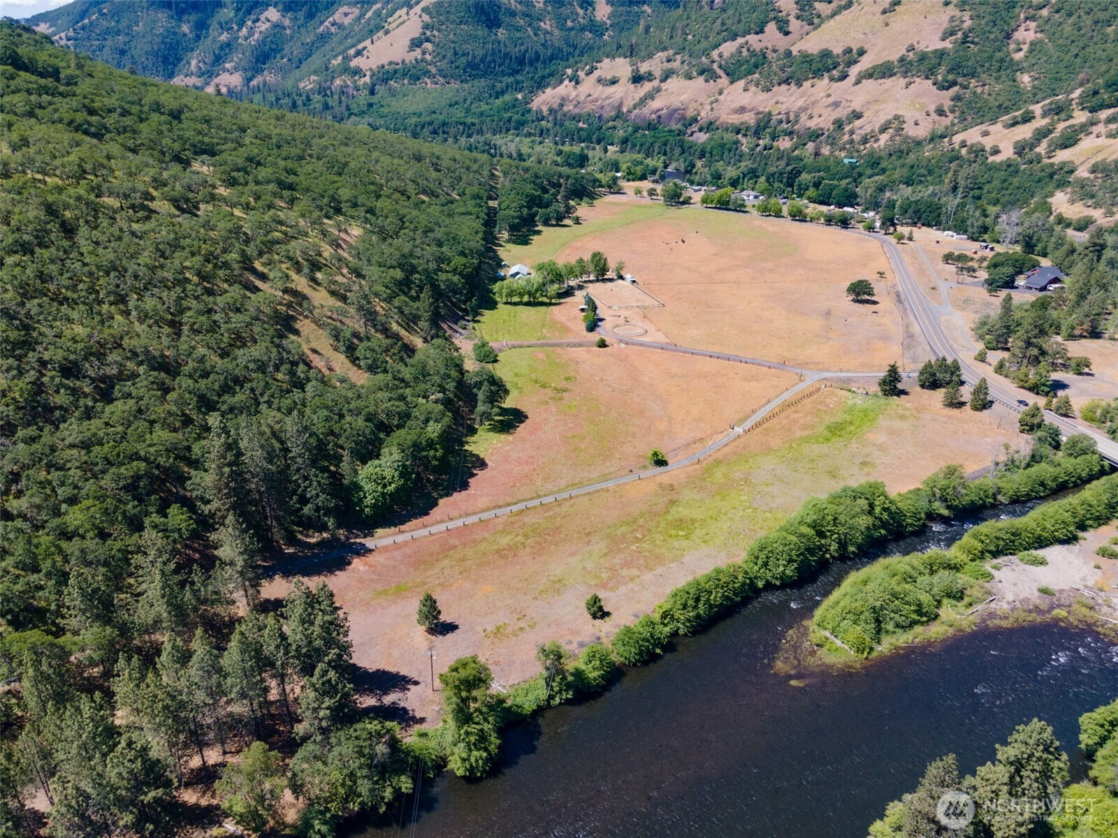 992 Highway 142 Lyle, WA 98635 - Photo 2 of 40 an aerial view of a house