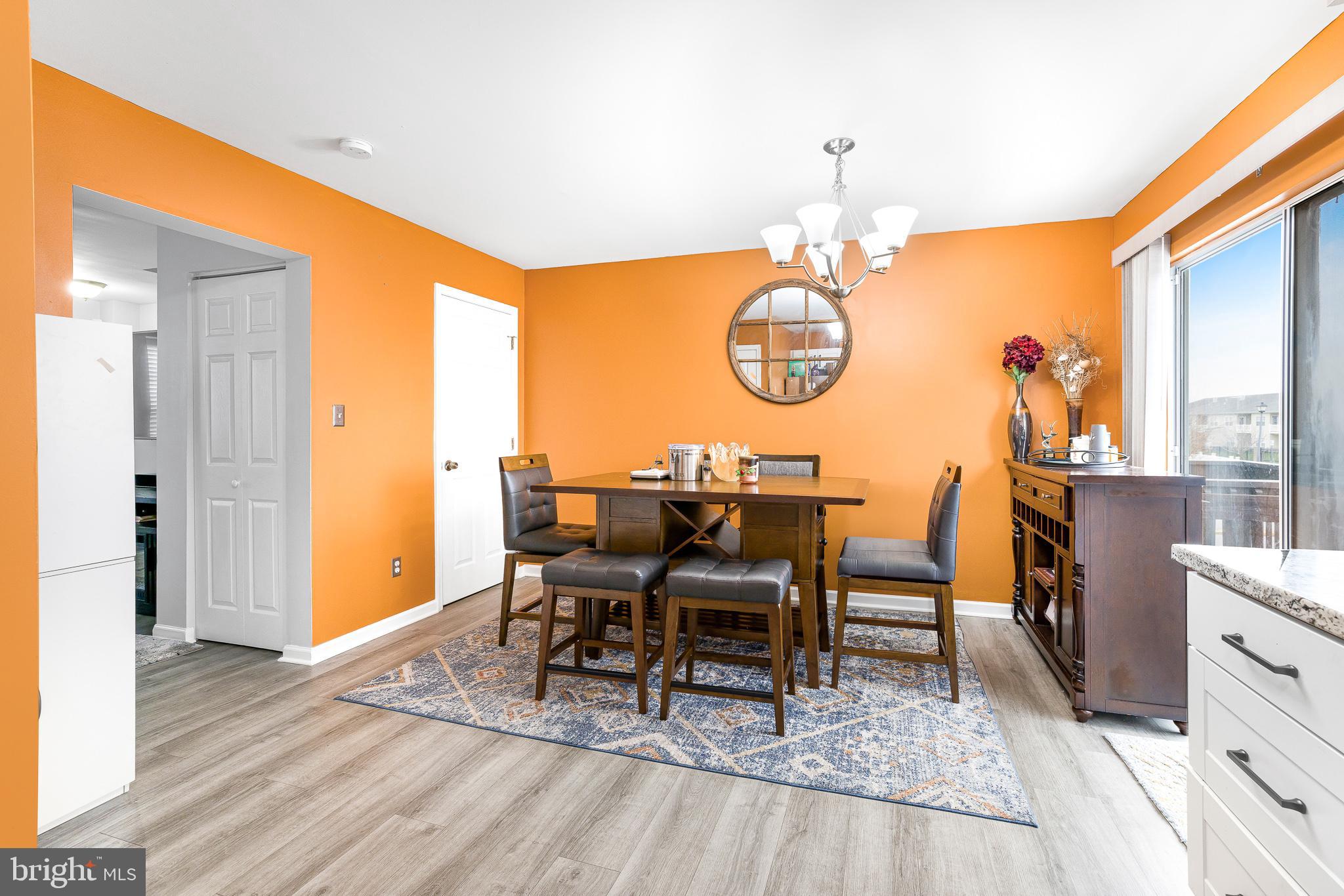 286 Vincent Circle Middletown, DE 19709 - Photo 12 of 29 a view of a dining room with furniture window and wooden floor