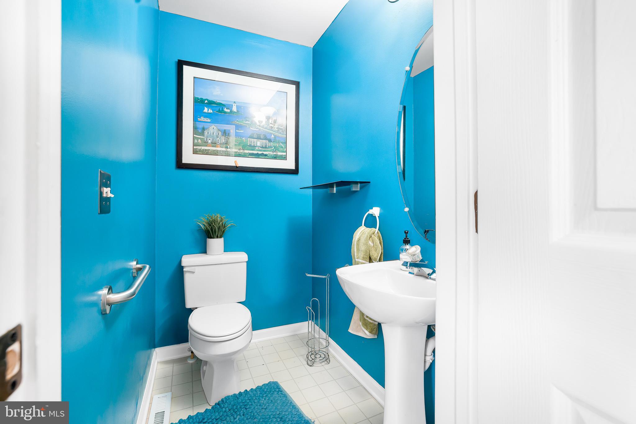 286 Vincent Circle Middletown, DE 19709 - Photo 13 of 29 a bathroom with a toilet a sink and a mirror
