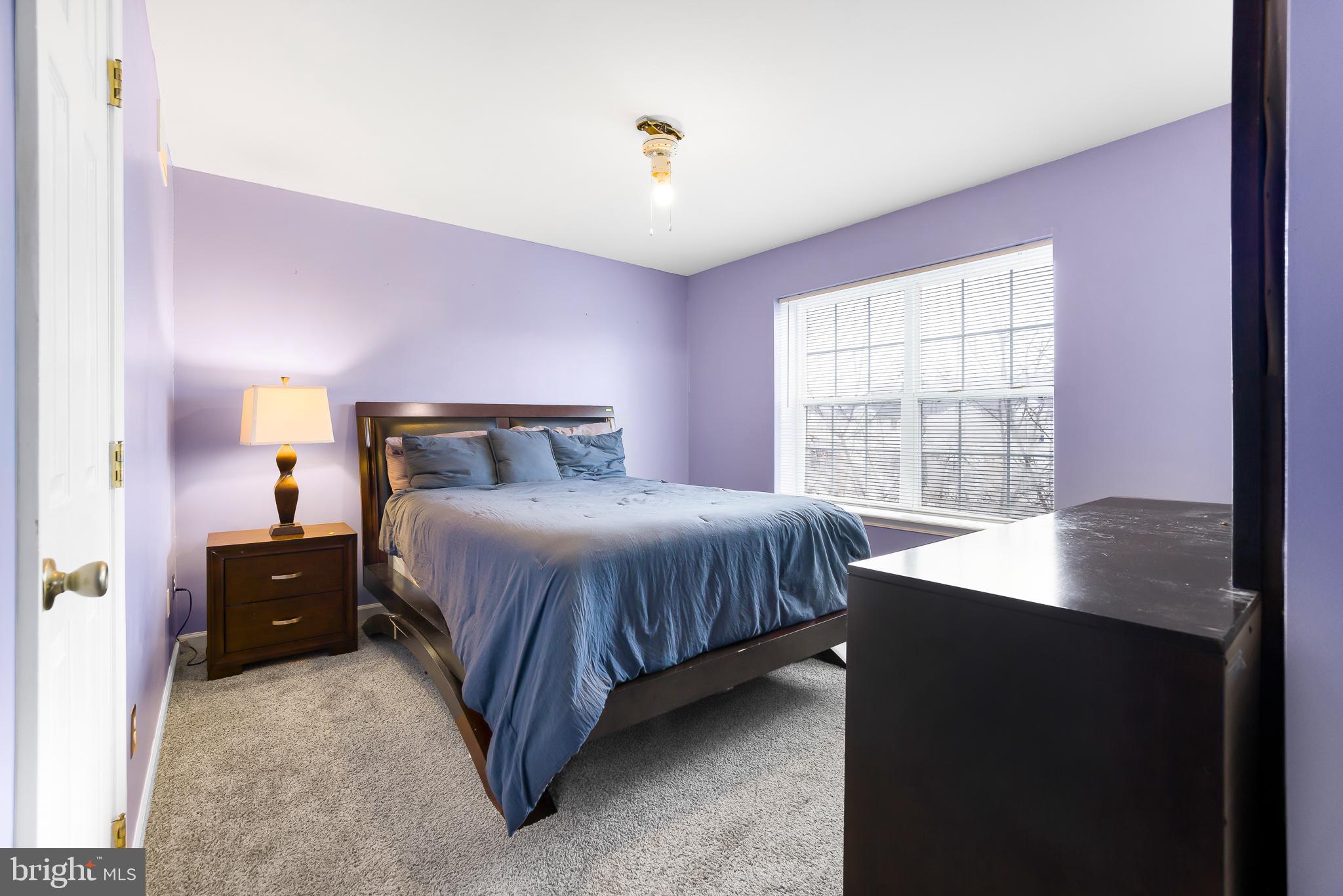 286 Vincent Circle Middletown, DE 19709 - Photo 17 of 29 a bedroom with a bed and a window