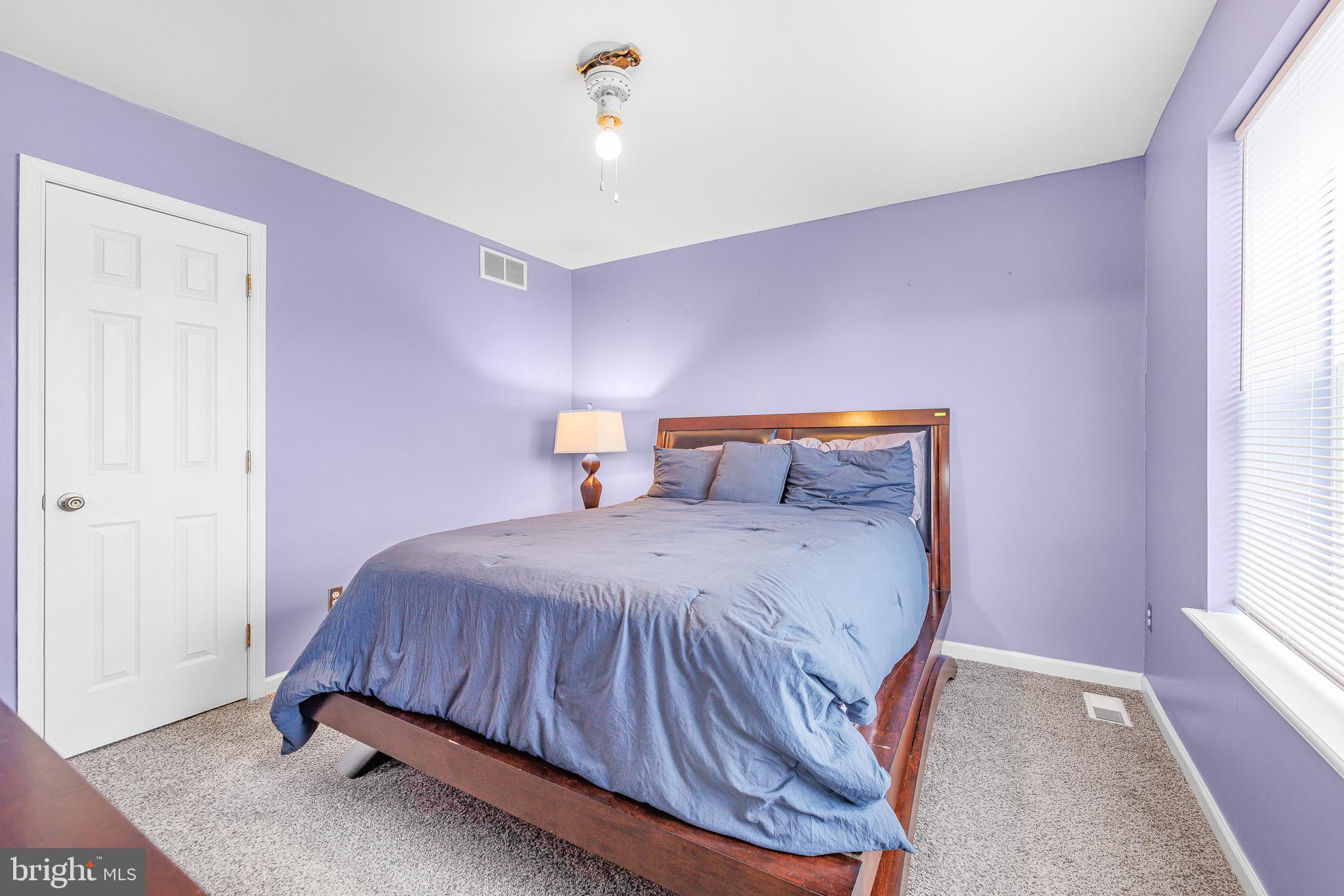 286 Vincent Circle Middletown, DE 19709 - Photo 18 of 29 a bedroom with a bed and window