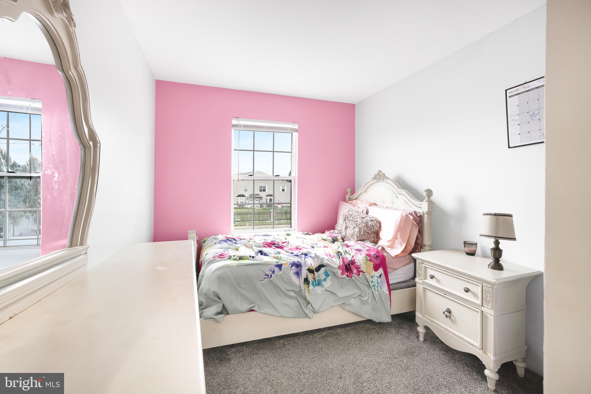 286 Vincent Circle Middletown, DE 19709 - Photo 21 of 29 a bedroom with a bed and a window