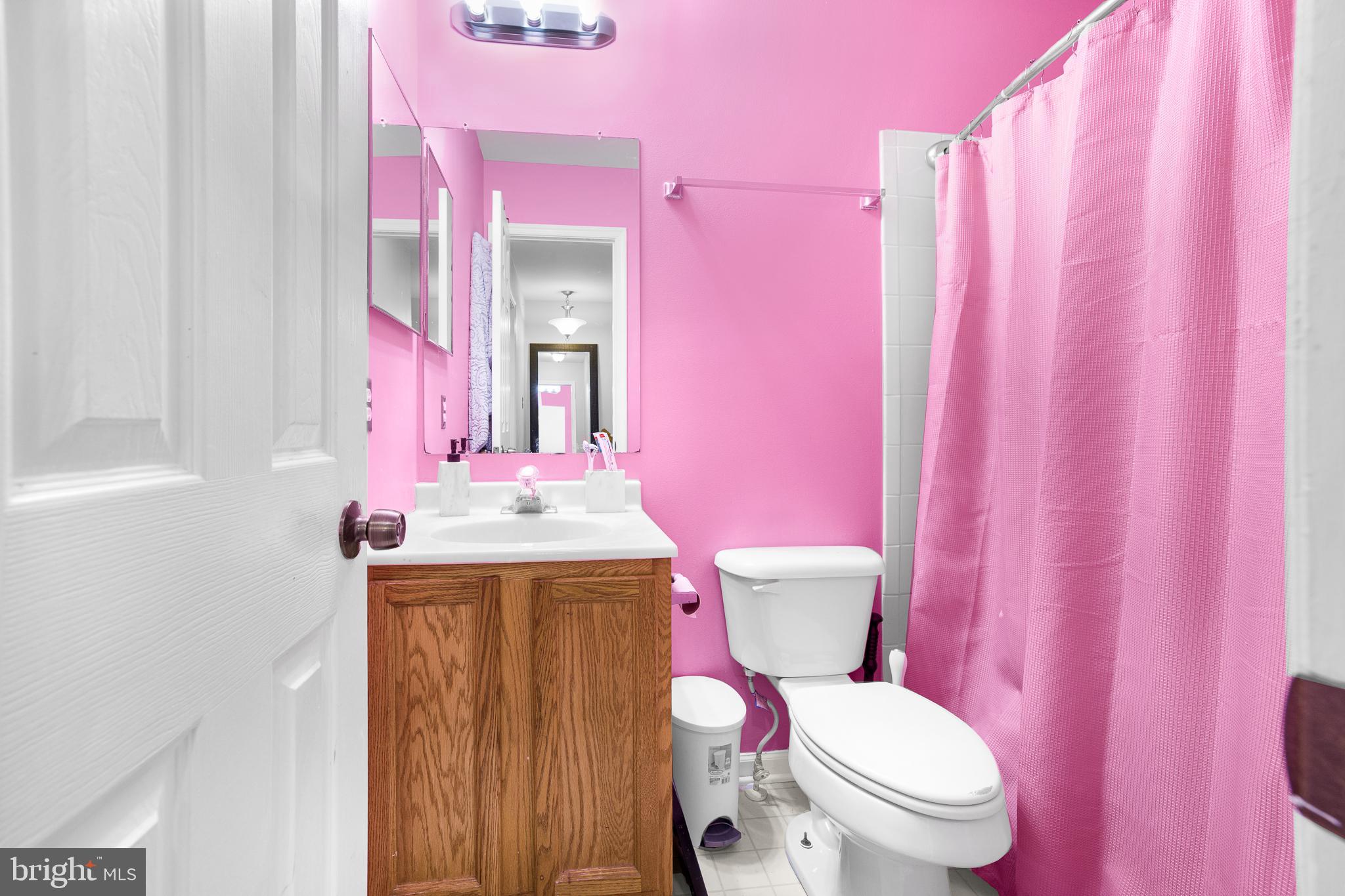 286 Vincent Circle Middletown, DE 19709 - Photo 24 of 29 a bathroom with a granite countertop toilet sink and mirror