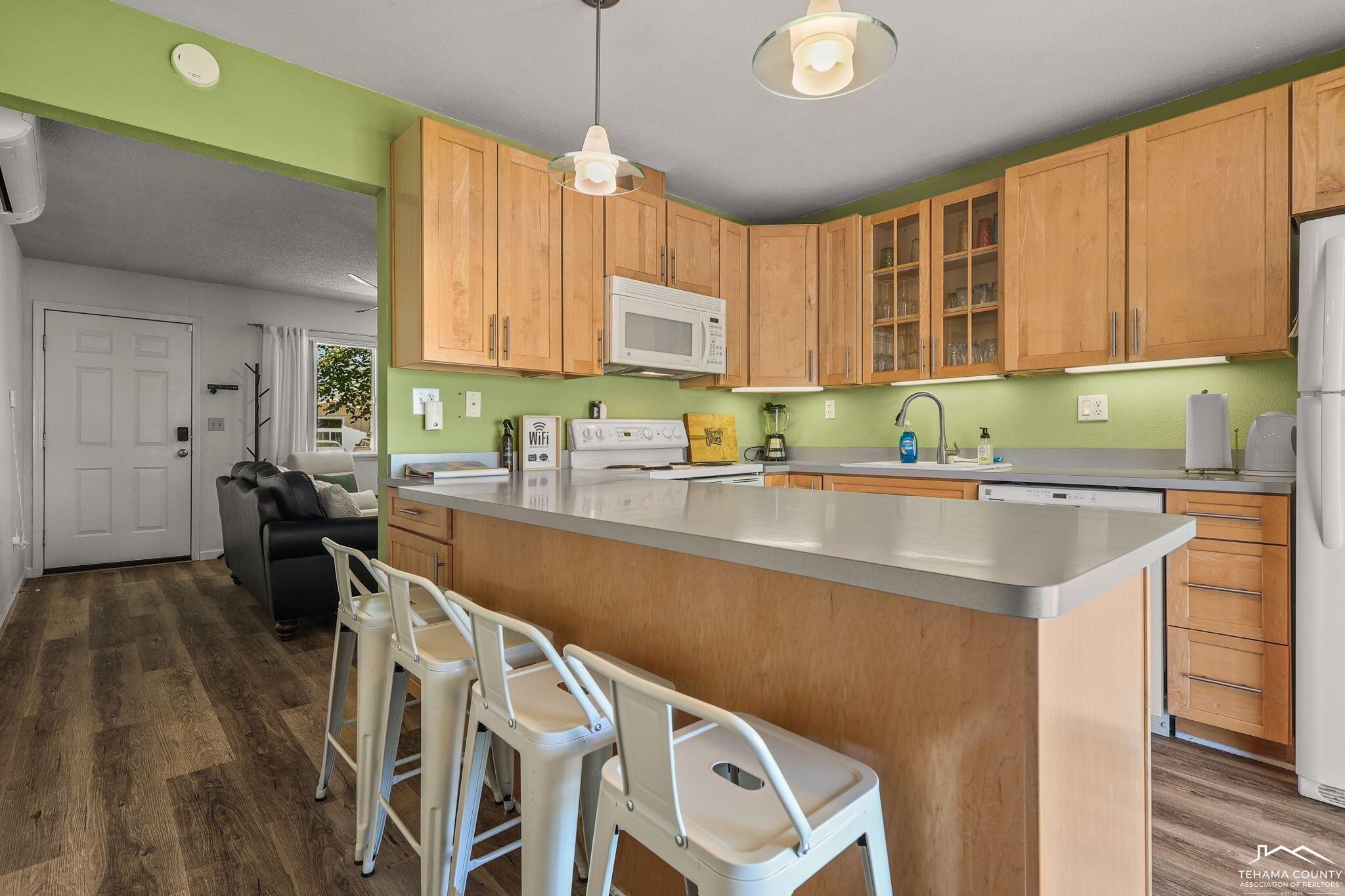 22275 Brent Road Red Bluff, CA 96080 - Photo 10 of 47 a kitchen with a sink a counter top space and appliances