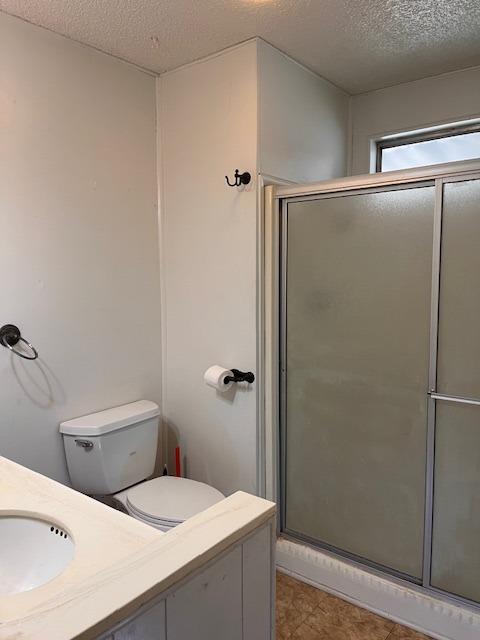 2706 West Ashlan Avenue, Unit 329 Fresno, CA 93705 - Photo 18 of 43 a en suite bathroom with a granite countertop sink