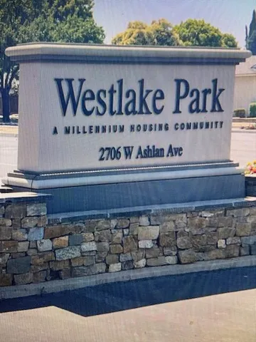 a workspace with furniture and wooden floor
