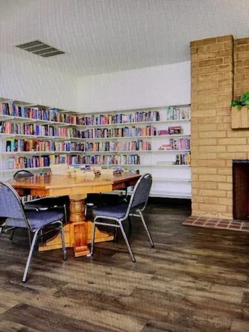 a living room with gym equipment