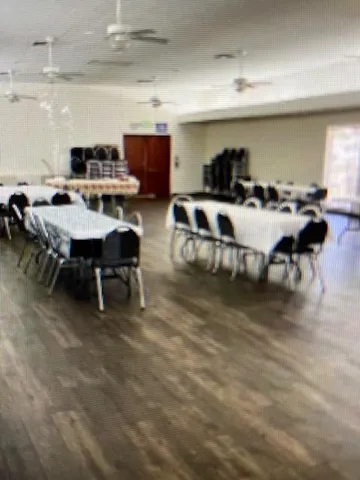 a view of a lake with outdoor seating