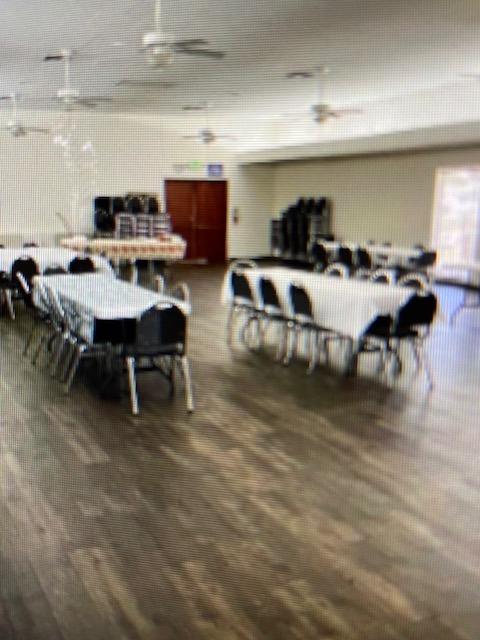 2706 West Ashlan Avenue, Unit 329 Fresno, CA 93705 - Photo 34 of 43 a living room with lots of furniture and view of kitchen