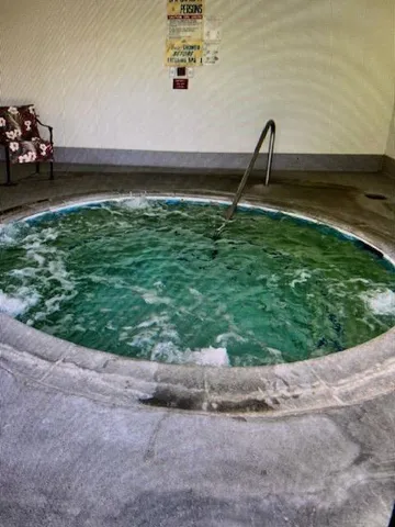 an aerial view of houses with yard