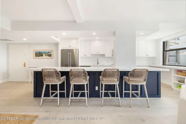 a bedroom with a bed a table and chair