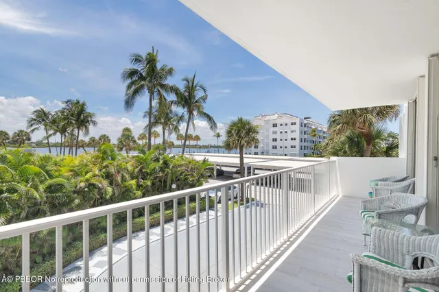 a view of a garden with a building in the background