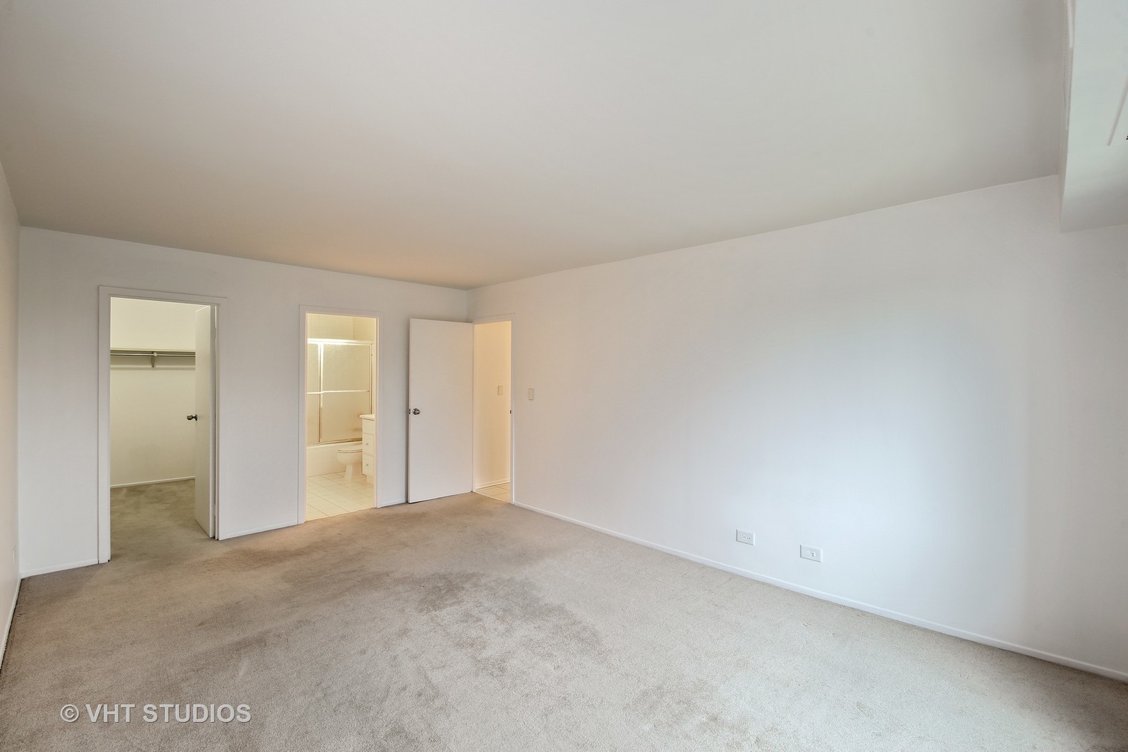 1615 East Central Road, Unit 417C Arlington Heights, IL 60005 - Photo 11 of 23 a view of an empty room and window