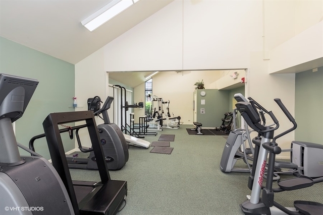 1615 East Central Road, Unit 417C Arlington Heights, IL 60005 - Photo 20 of 23 a view of a room with gym equipment