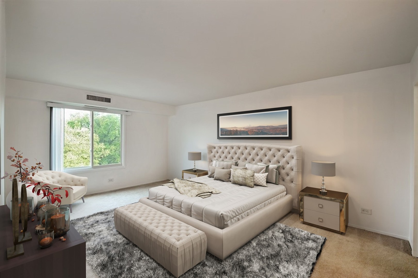 1615 East Central Road, Unit 417C Arlington Heights, IL 60005 - Photo 4 of 23 a bedroom with a bed and a couch