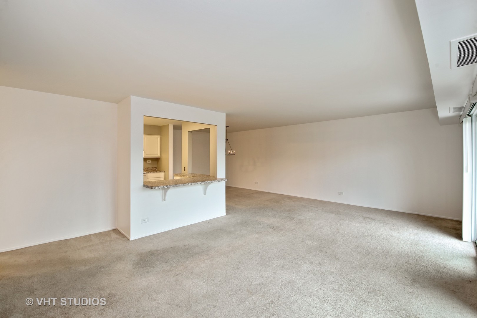 1615 East Central Road, Unit 417C Arlington Heights, IL 60005 - Photo 6 of 23 an empty room with a window