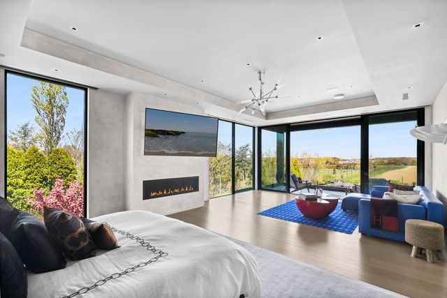 a view of a balcony with furniture