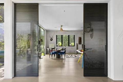 a outdoor living space with furniture and a fireplace