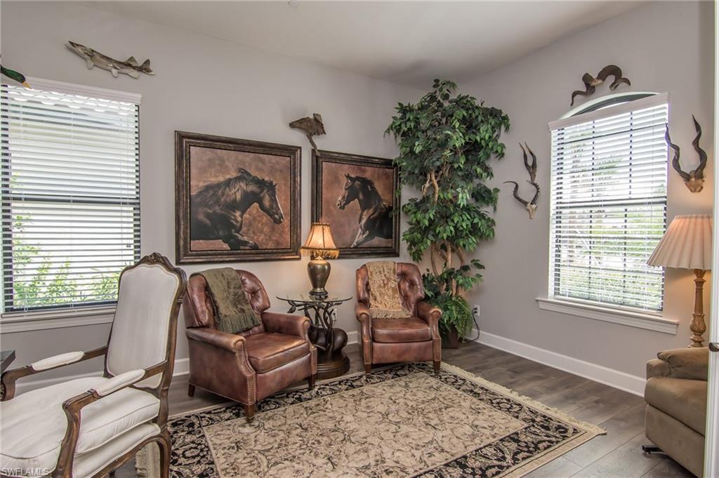 10249 Coconut Road Estero, FL 34135 - Photo 18 of 27 a living room with furniture and a window