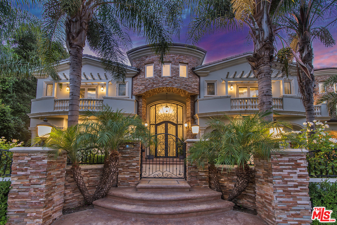15506 Meadowgate Road Encino, CA 91436 - Photo 3 of 50 a view of a building with a garden