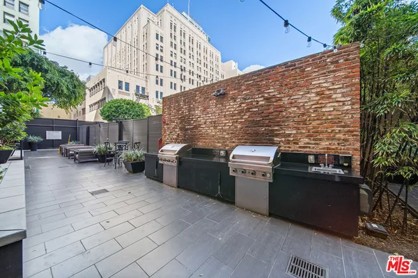 a view of a tables and chairs in patio