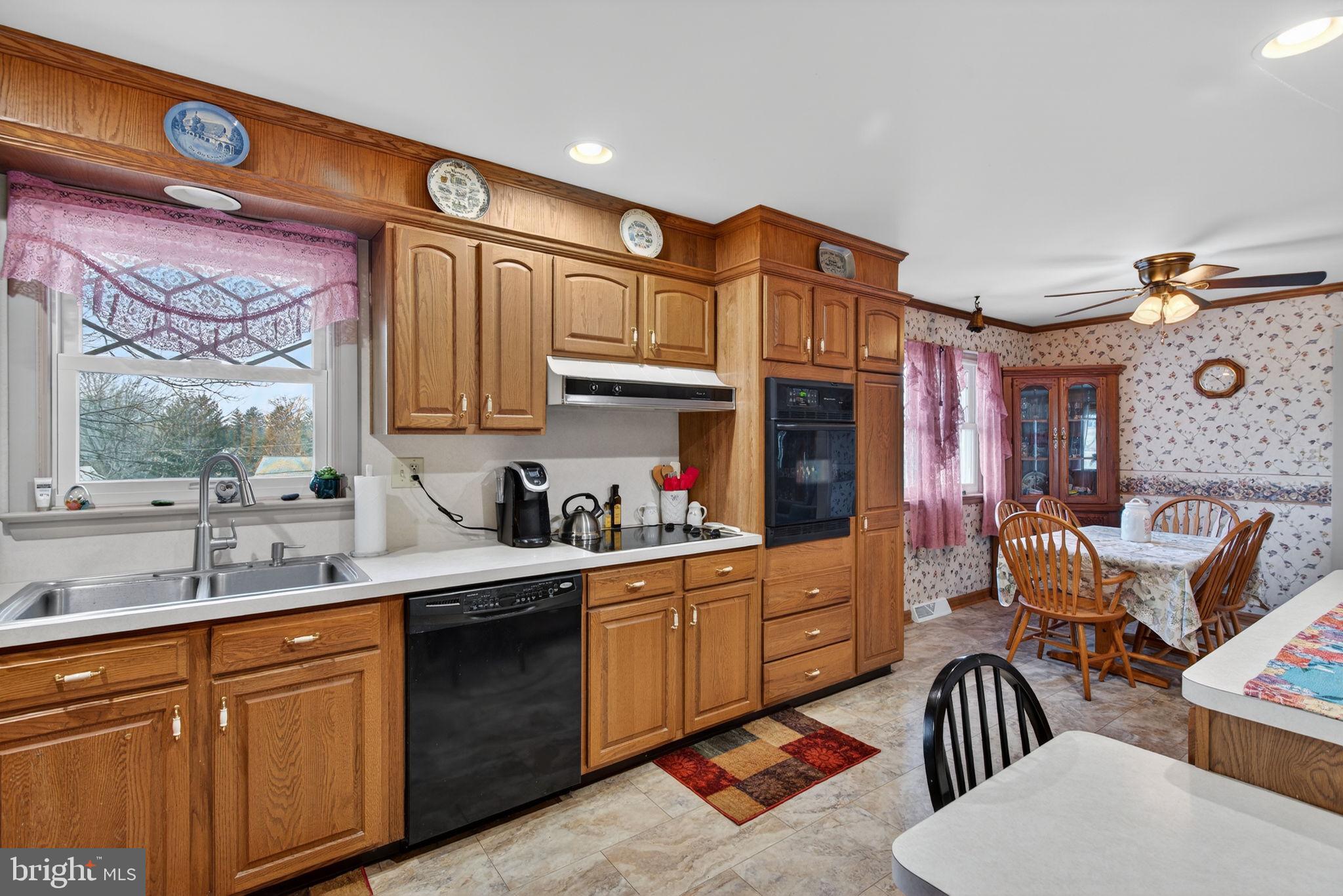 960 Nissley Road Lancaster, PA 17601 - Photo 20 of 24 a kitchen with stainless steel appliances granite countertop a sink and cabinets