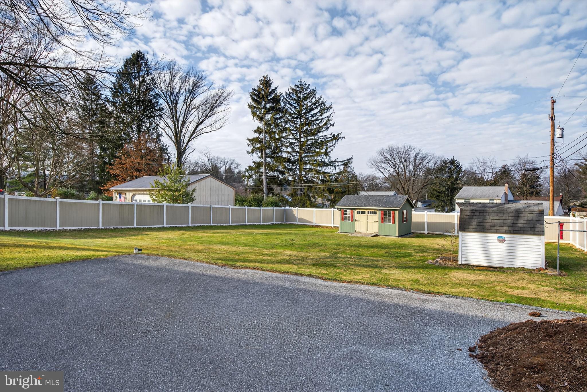 960 Nissley Road Lancaster, PA 17601 - Photo 2 of 24 a view of a house with a yard and a large tree