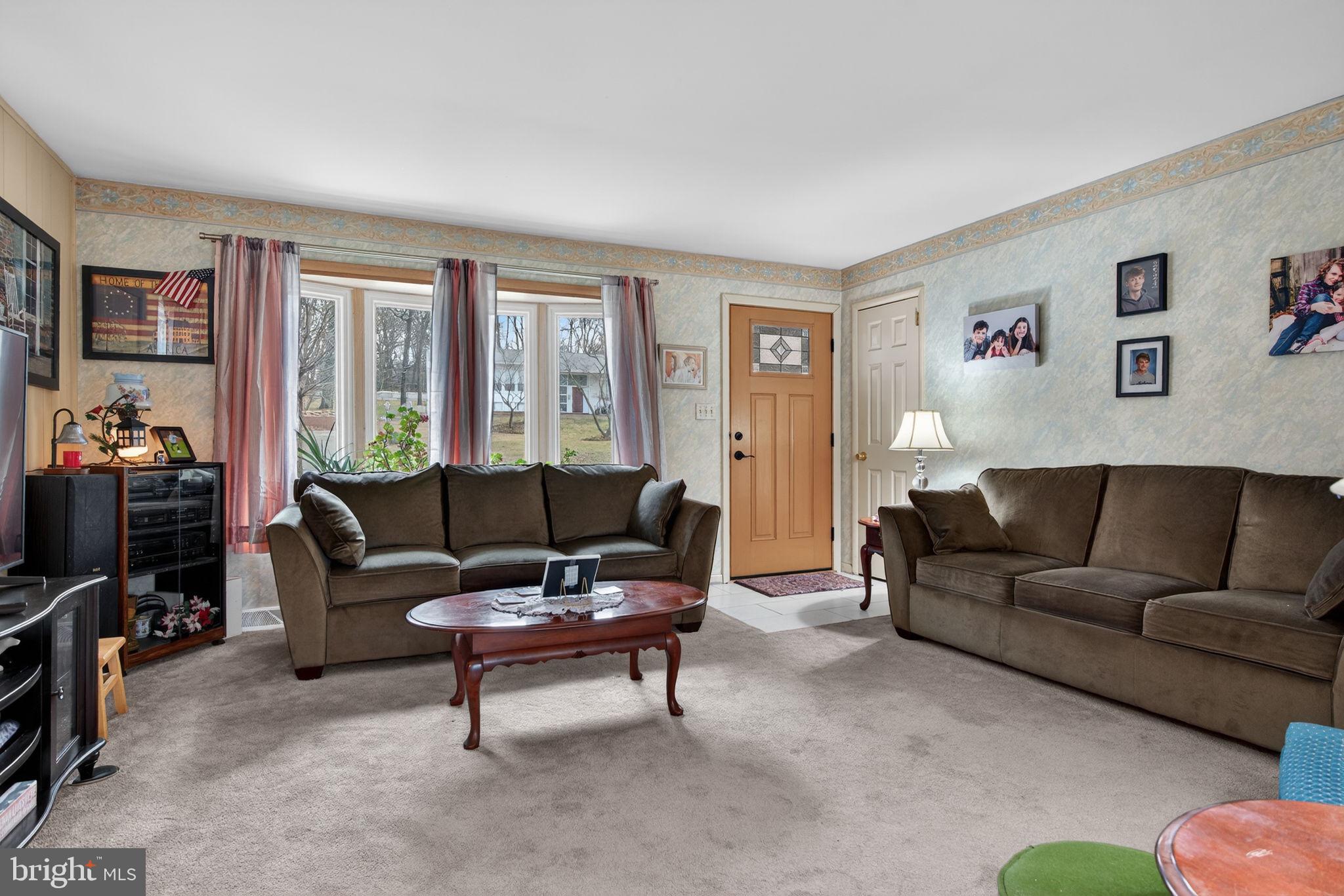 960 Nissley Road Lancaster, PA 17601 - Photo 5 of 24 a living room with furniture and a flat screen tv