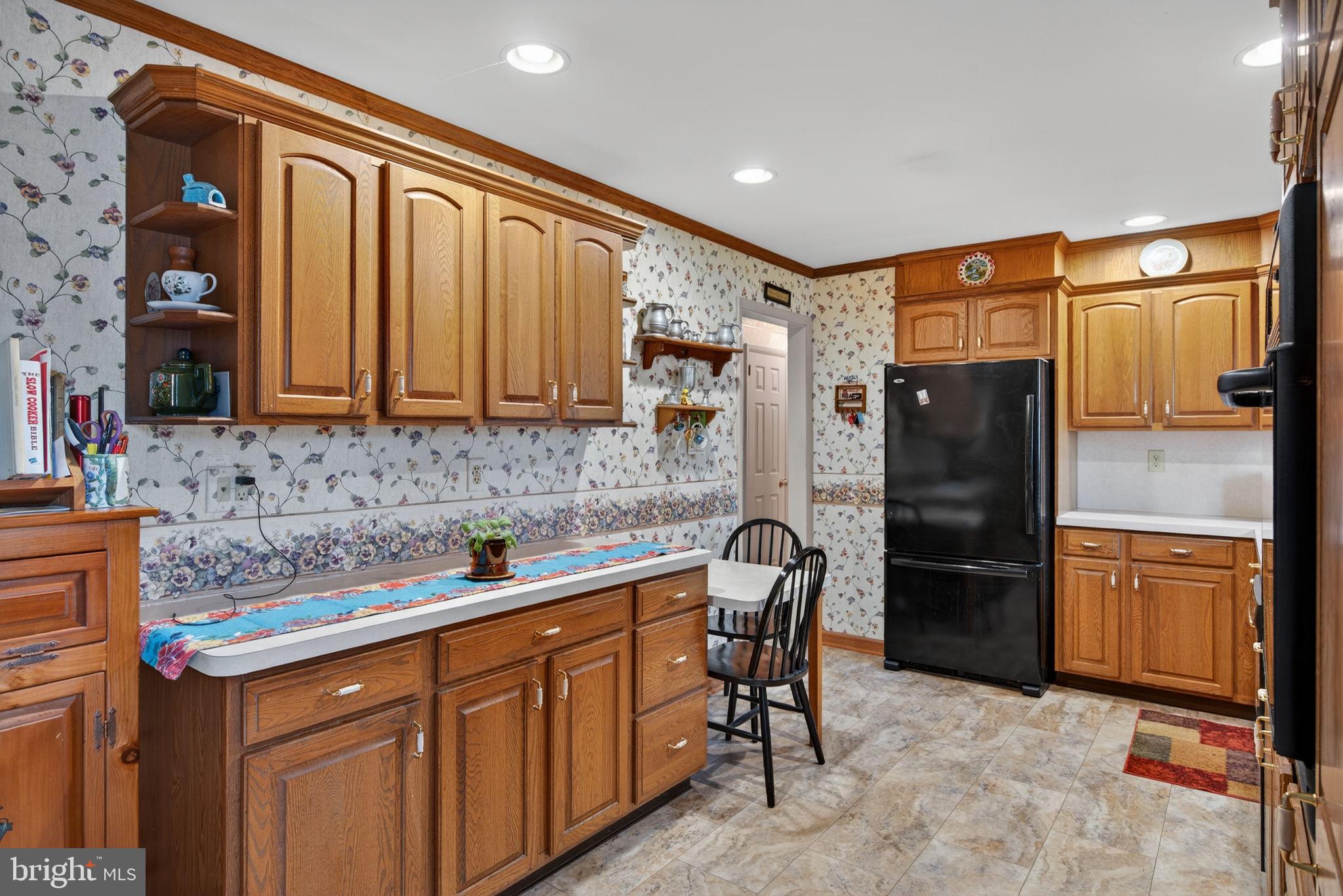960 Nissley Road Lancaster, PA 17601 - Photo 8 of 24 a kitchen with stainless steel appliances granite countertop a refrigerator and a sink