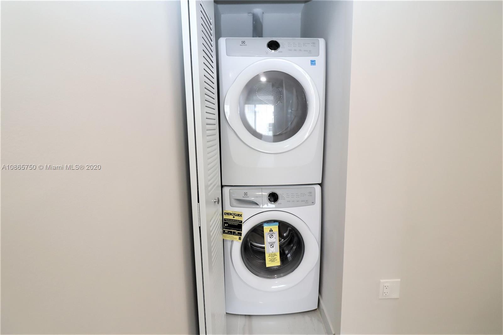 13966 Southwest 259th Terrace Homestead, FL 33032 - Photo 26 of 27 a utility room with dryer and washer
