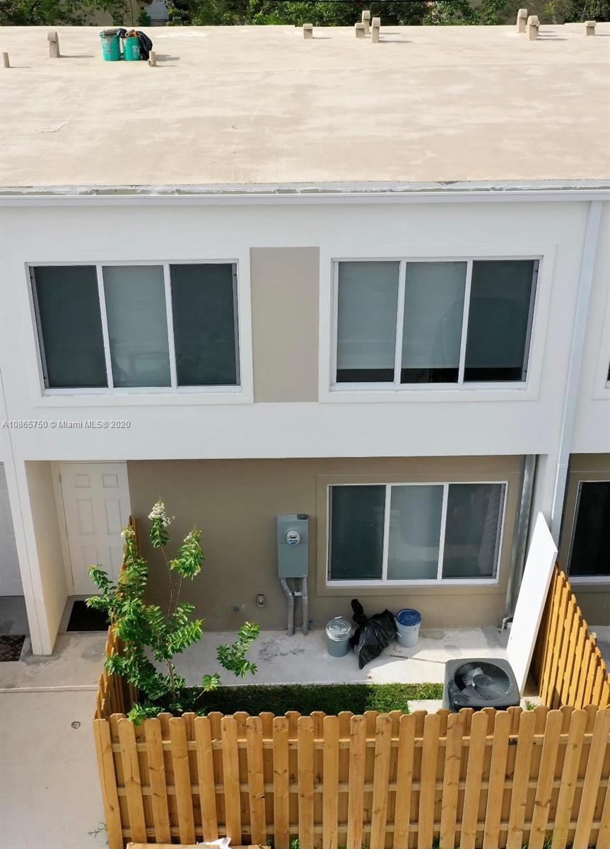 13966 Southwest 259th Terrace Homestead, FL 33032 - Photo 27 of 27 a front view of a house with a yard