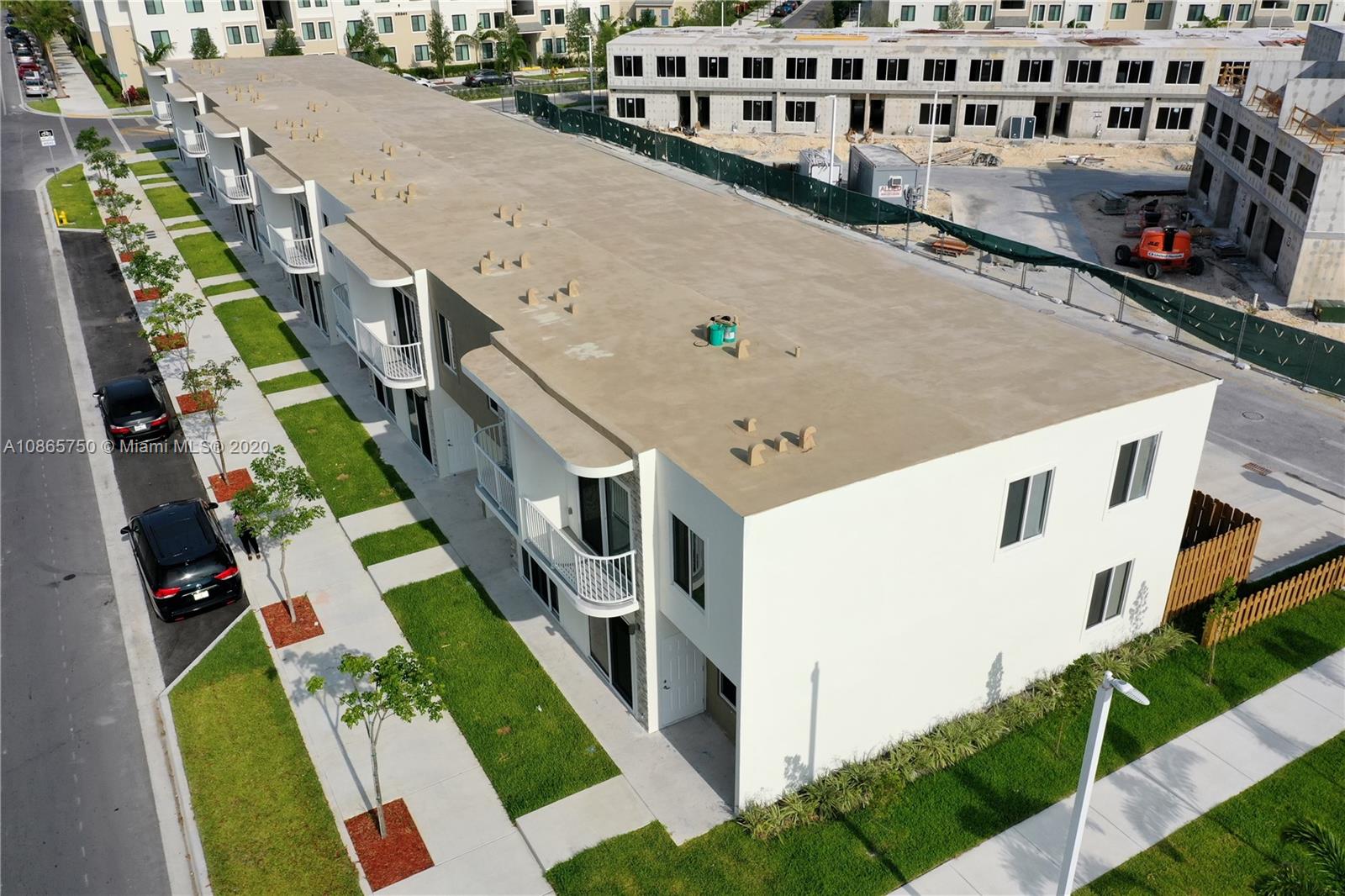 13966 Southwest 259th Terrace Homestead, FL 33032 - Photo 6 of 27 a view of an buildings from a balcony