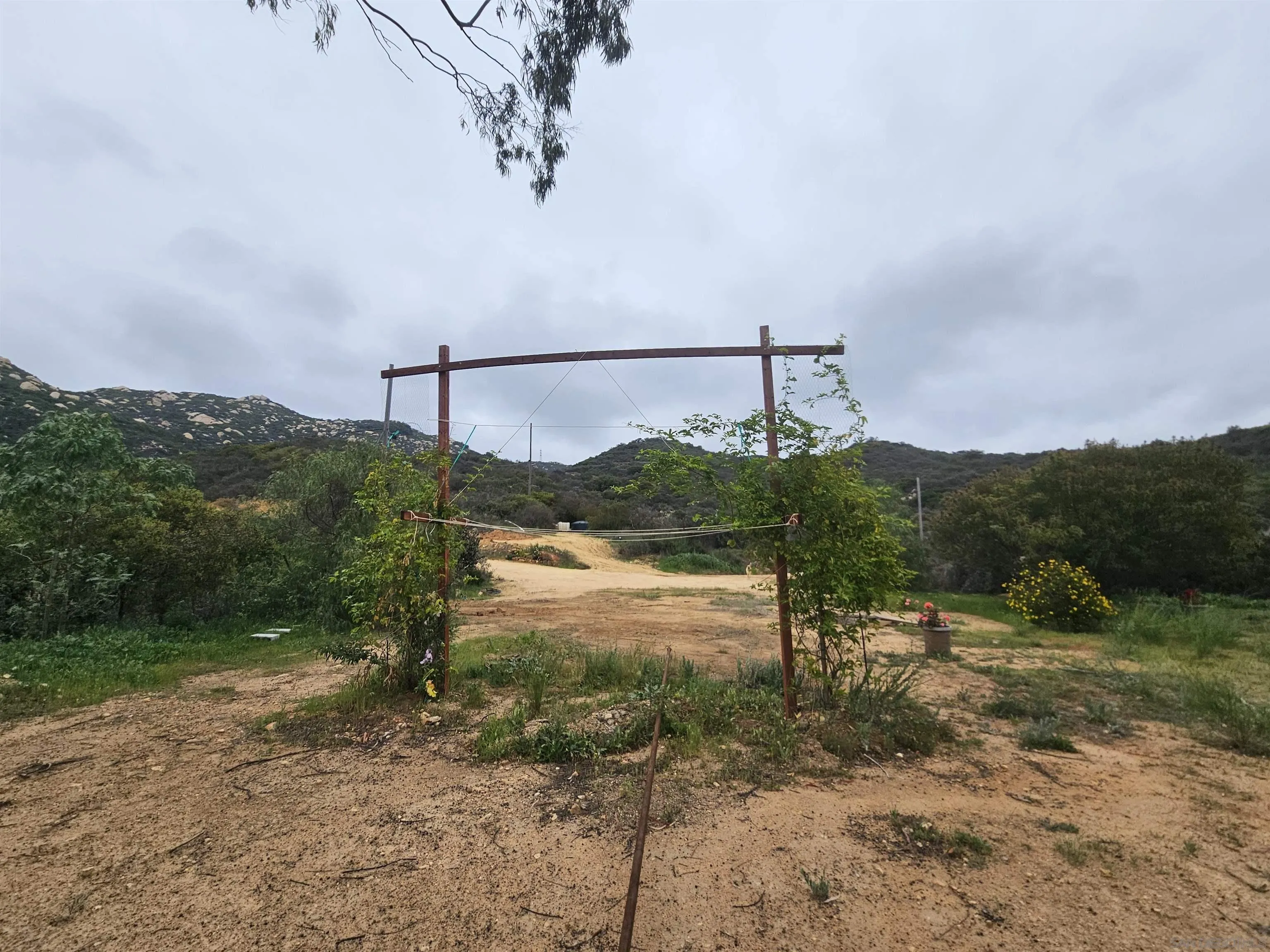 6465 Rainbow Heights Road, Unit 2 Fallbrook, CA 92028 - Photo 23 of 36 a view of a lake with a mountain in the background