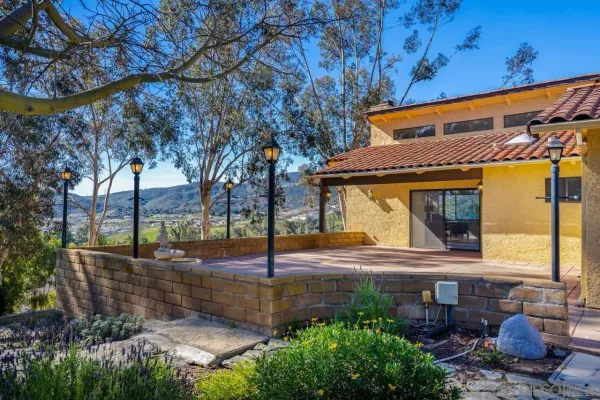 a view of a house with a patio