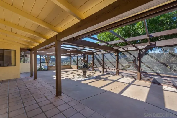 a view of entryway with a table and chairs