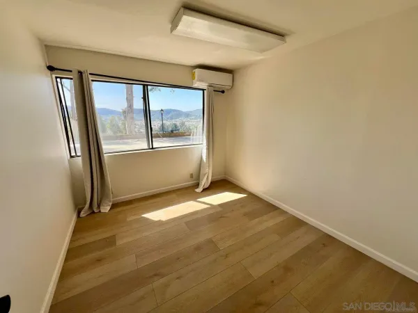 an empty room with a window