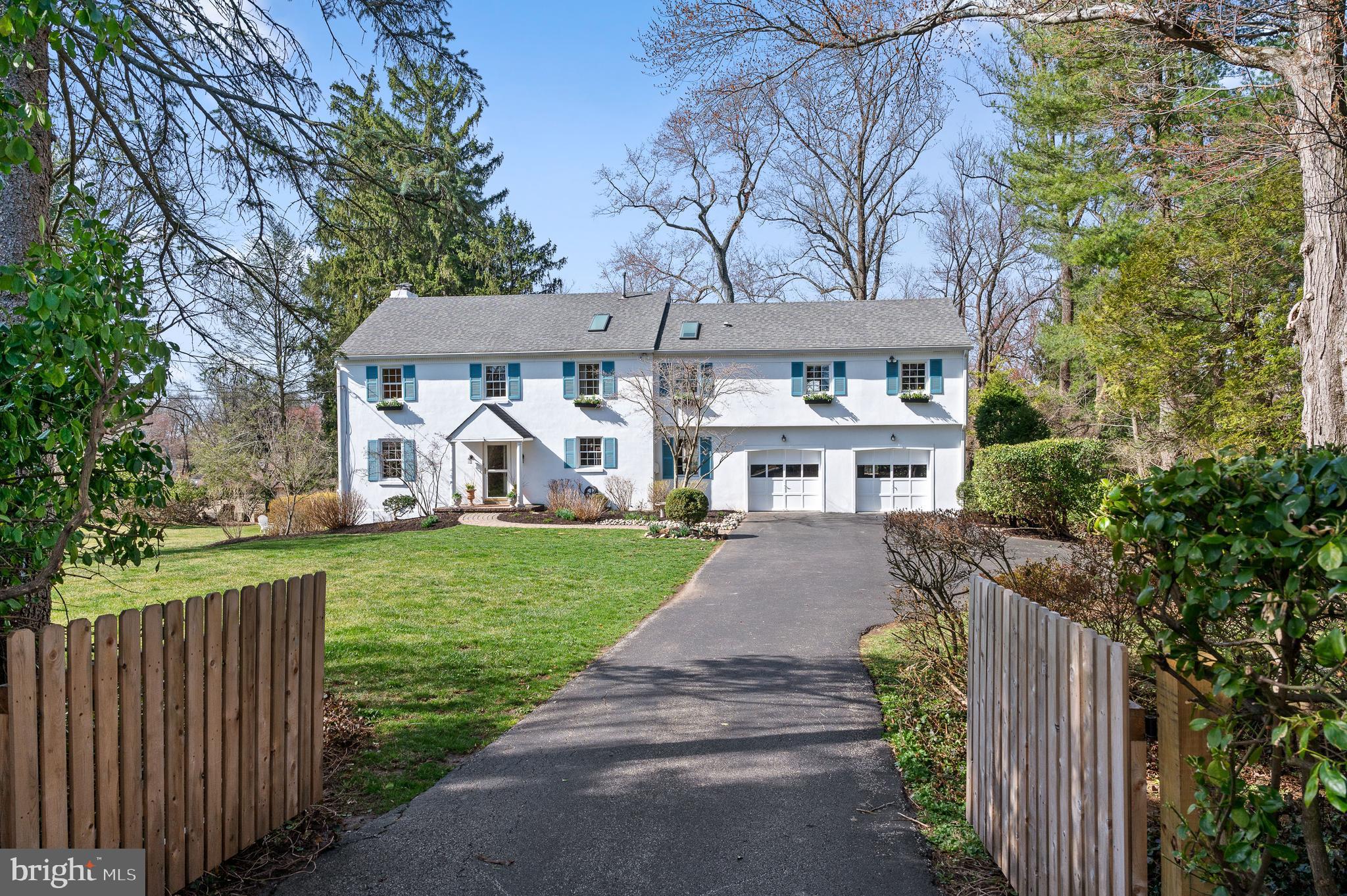 284 West Valley Road Wayne, PA 19087 - Photo 1 of 35 a front view of a house with garden