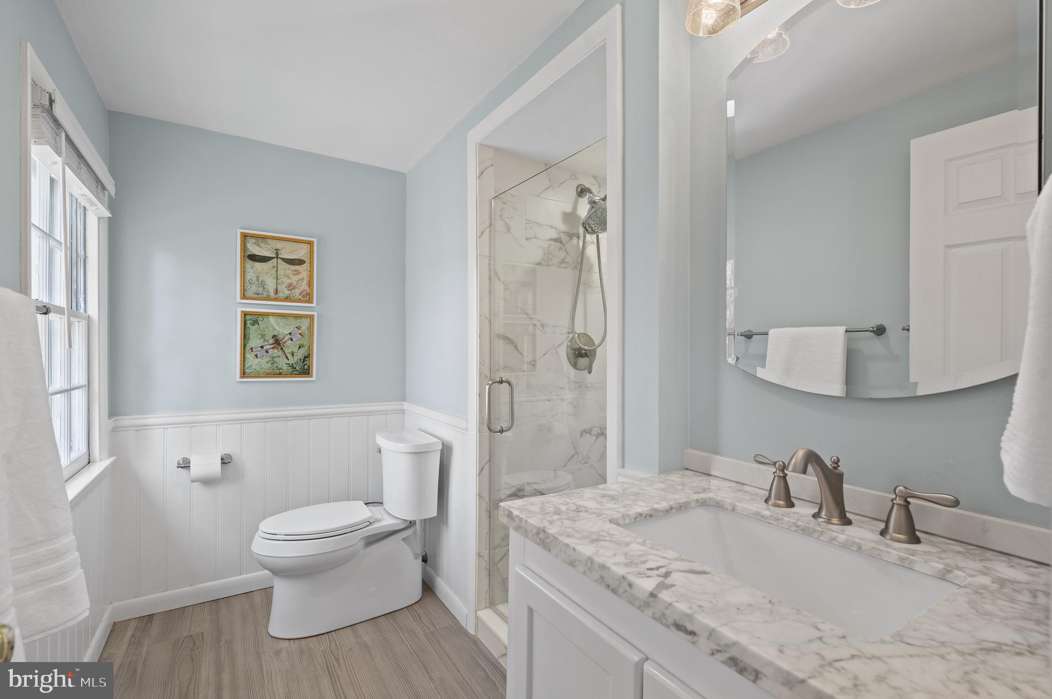 284 West Valley Road Wayne, PA 19087 - Photo 20 of 35 a white toilet sitting next to a bathroom sink