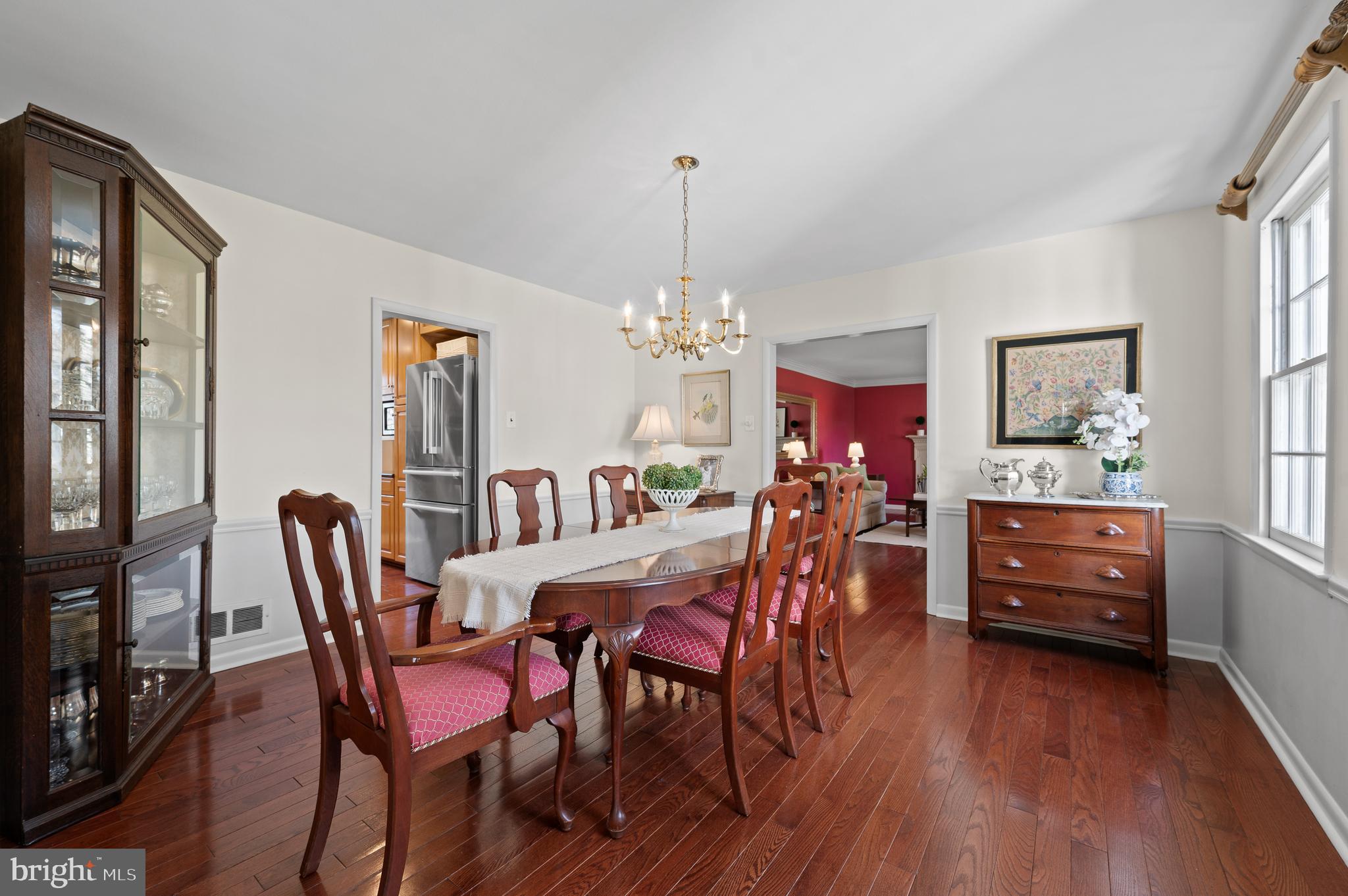 284 West Valley Road Wayne, PA 19087 - Photo 9 of 35 a view of a dining room with furniture wooden floor and chandelier