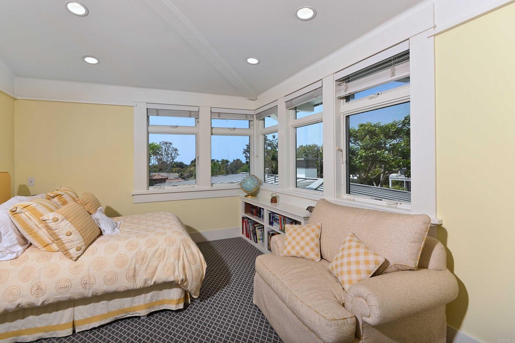 441 Oceanview Terrace Encinitas, CA 92024 - Photo 22 of 34 a bedroom with a large bed and a large window
