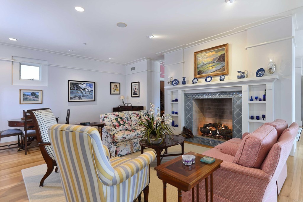 441 Oceanview Terrace Encinitas, CA 92024 - Photo 6 of 34 a living room with furniture and a fireplace