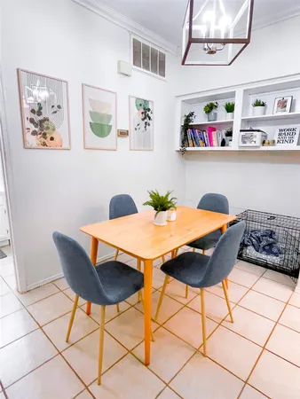 a view of a dining room with furniture