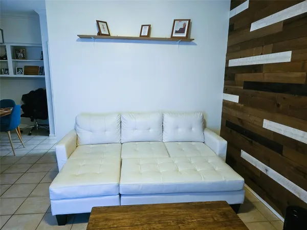 a bedroom with a bed and furniture