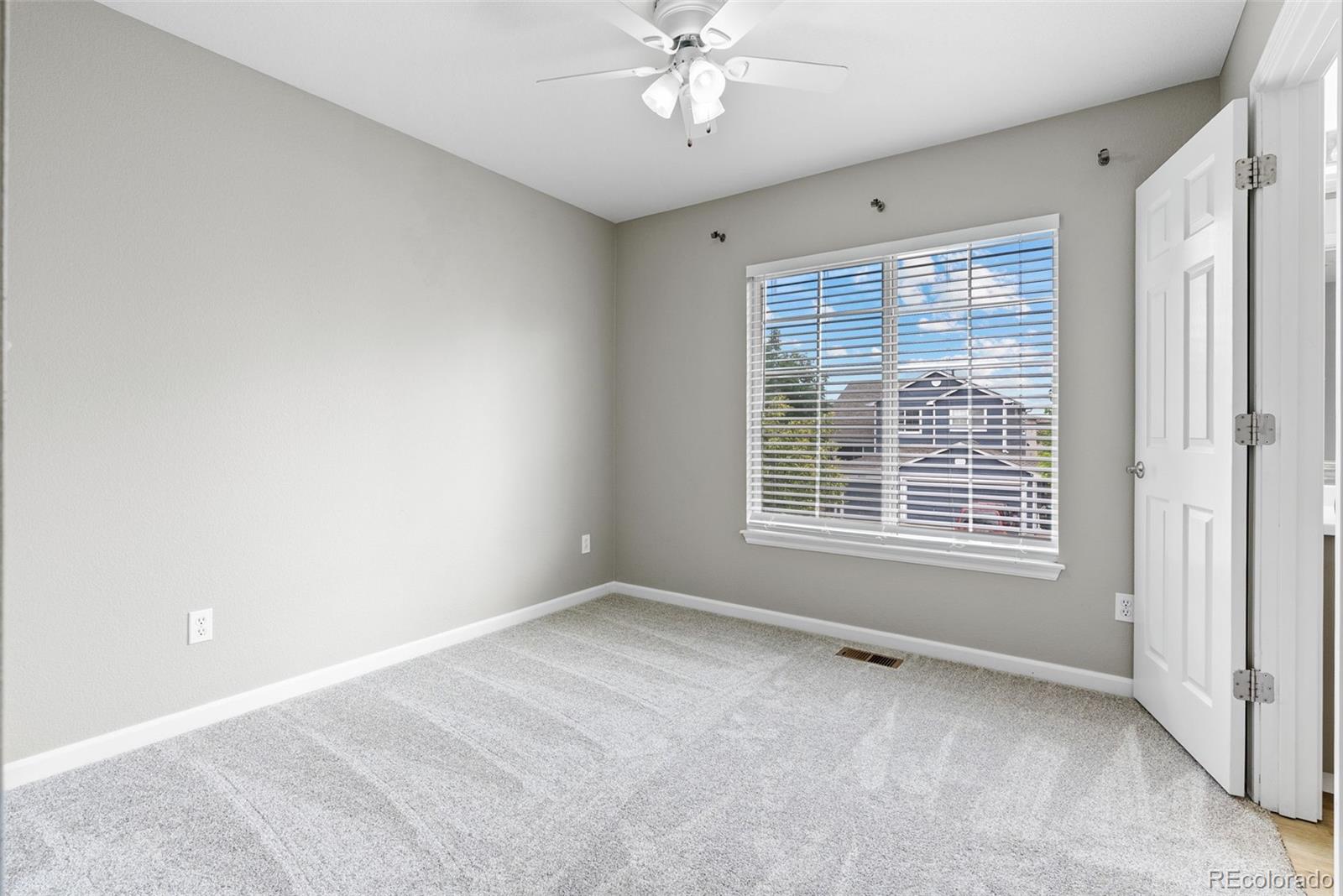 8743 Wildrye Circle Parker, CO 80134 - Photo 20 of 35 a view of an empty room with a window