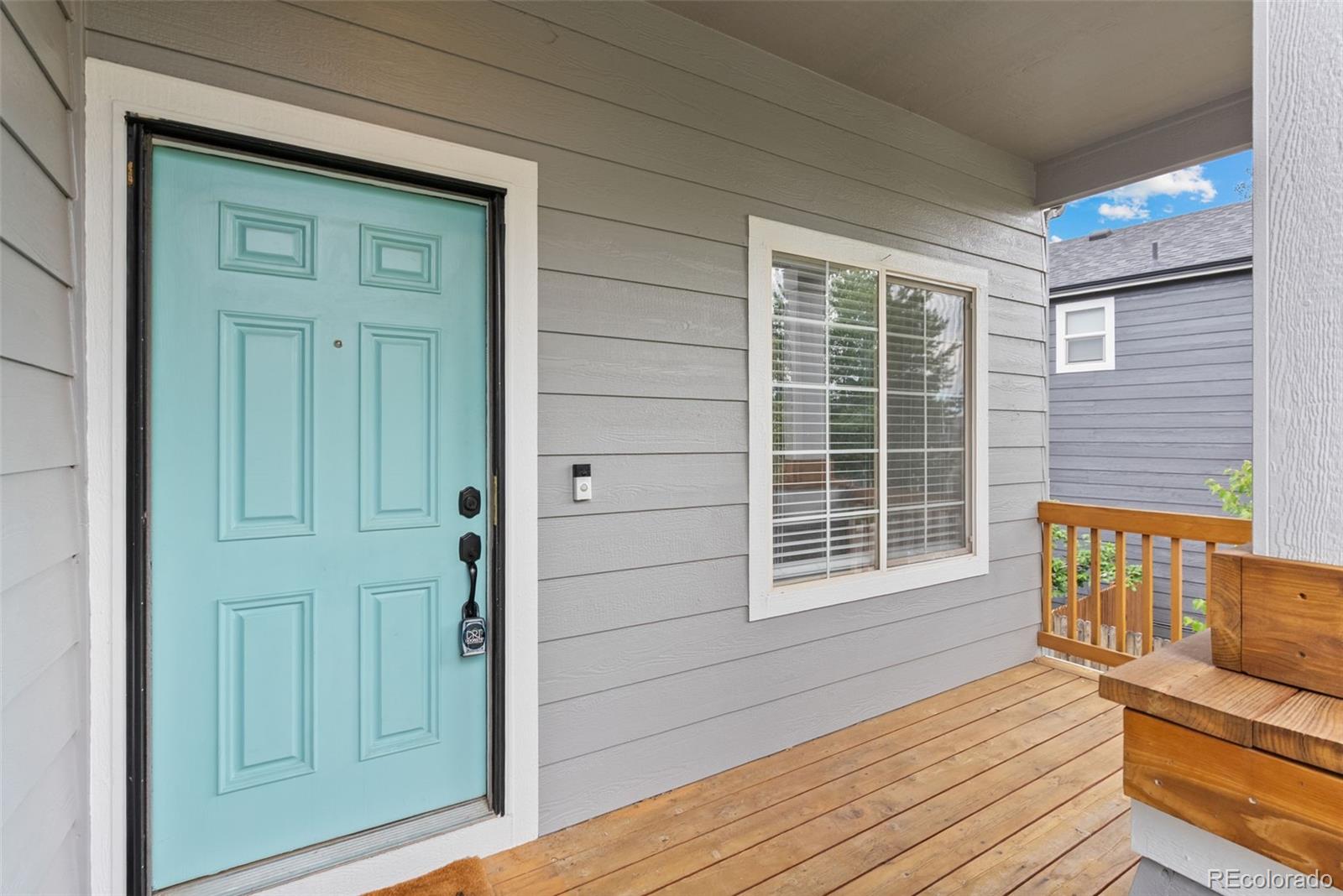 8743 Wildrye Circle Parker, CO 80134 - Photo 2 of 35 a view of a house with a door and wooden floor