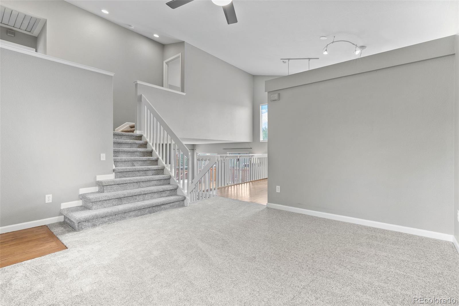 8743 Wildrye Circle Parker, CO 80134 - Photo 4 of 35 a view of an empty room with stairs