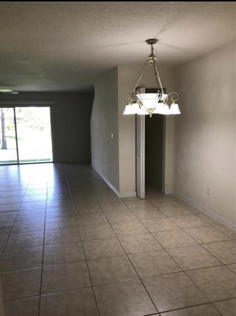 3003 Southeast Lexington Lakes Drive, Unit 2 Stuart, FL 34994 - Photo 3 of 40 548803EA-CB36-400C-B7F1-38C1C853358D