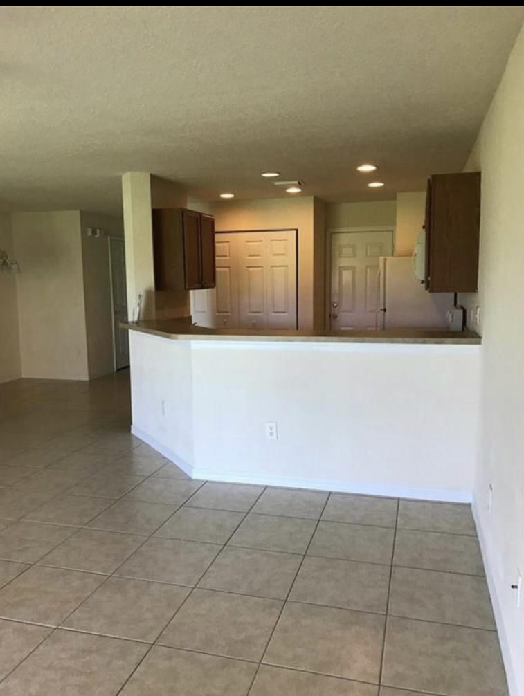 3003 Southeast Lexington Lakes Drive, Unit 2 Stuart, FL 34994 - Photo 6 of 40 2EEF1FEA-B594-4BB5-A96B-81A53A7F5F01