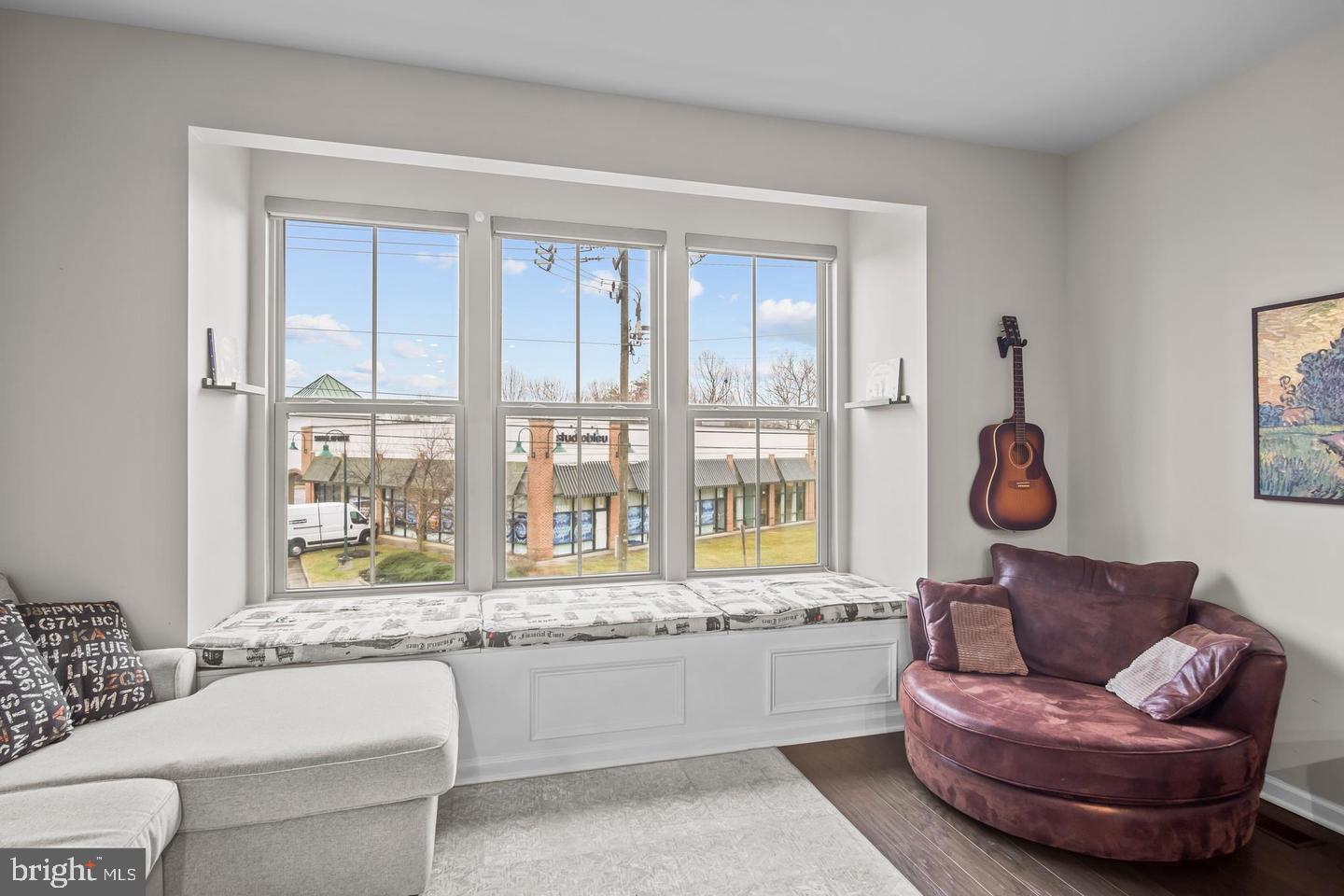 43821 Stubble Cor Square Ashburn, VA 20147 - Photo 11 of 25 a living room with furniture and a large window