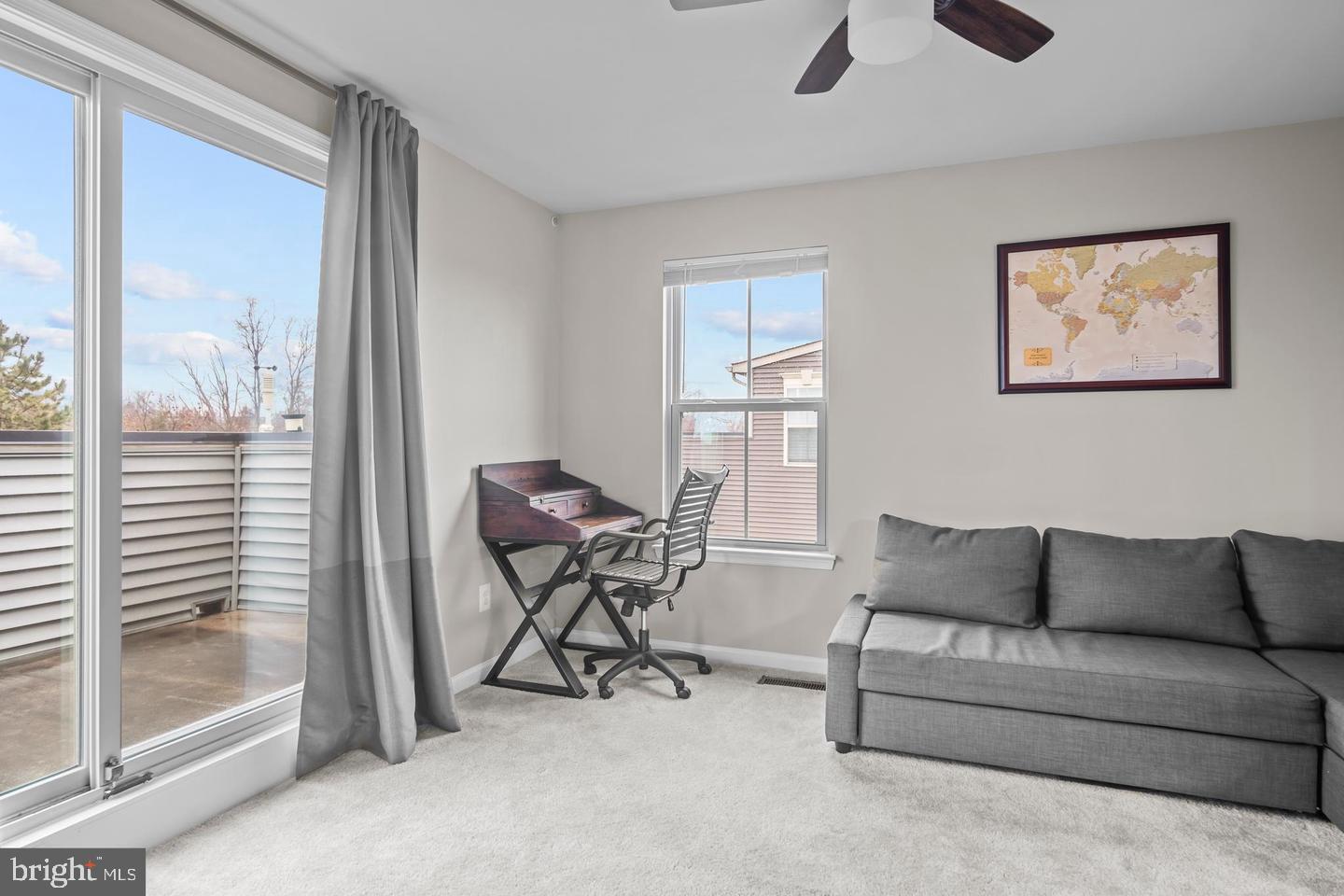 43821 Stubble Cor Square Ashburn, VA 20147 - Photo 19 of 25 a living room with furniture and a window